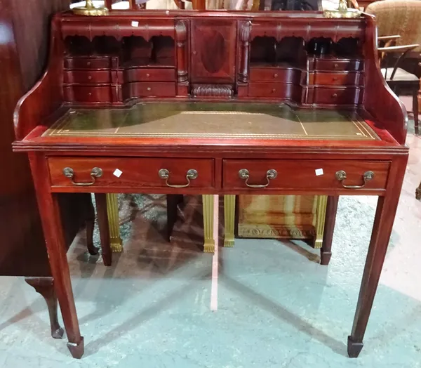 A George III style mahogany writing desk with fitted interior on tapering square supports, 101cm wide x 108cm high.   F6