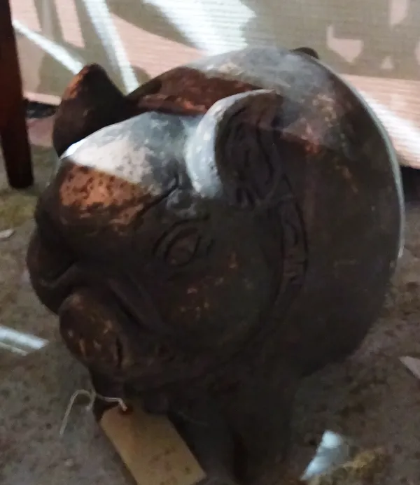 A terracotta figure of a stylised pig, 45cm wide x 32cm high.  H3