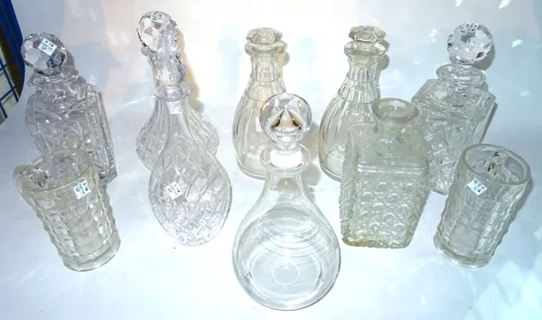 Glass, comprising; eight cut glass decanters and two cut glass goblets.  S2M
