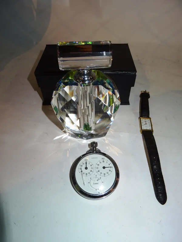 'Raymond Weil', an 18ct gold plated wristwatch, a Junghans stop-watch and a faceted glass scent bottle, (3).  CAB