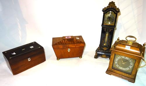 A George III mahogany tea caddy of sarcophagus form 19cm wide x 11cm high, an early 20th century rosewood tea caddy 19cm wide x 10cm high, a miniature