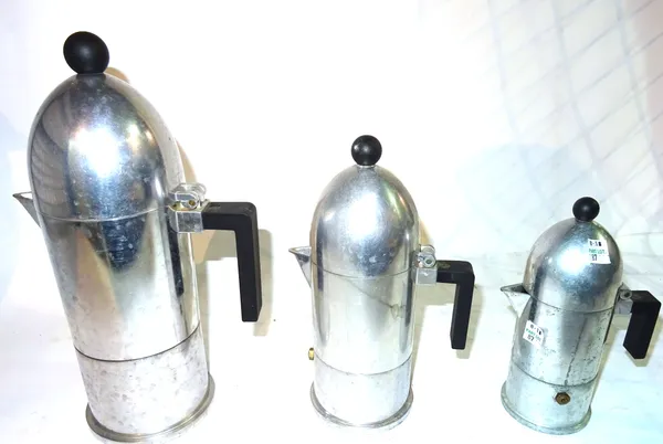 A 20th century steel three piece coffee set formed as a graduated set of Artillery shells, the largest 29cm tall (3).   CAB