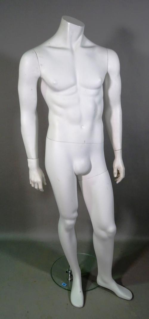 A 20th century shop display mannequin on circular chrome and glass base.   H8