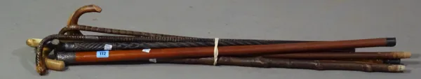 A quantity of mostly early 20th century walking sticks, to include a silver mounted ebony walking stick, a silver mounted faux bamboo stick and six ot