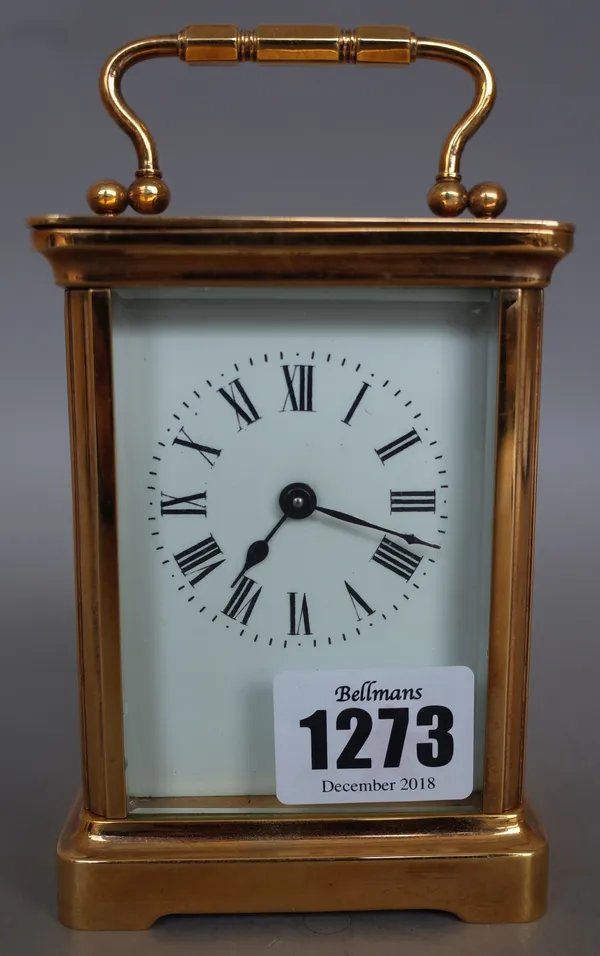 A French R&C brass cased carriage clock, early 20th century, with visible platform escapement and single train movement (11cm, high) with a leather tr