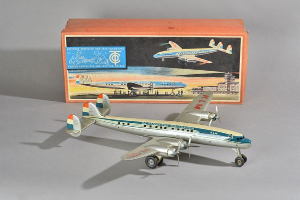 An Arnold (Western Germany) tinplate KLM Flying Dutchman friction drive aeroplane, circa 1950, 47cm, boxed. Illustrated.