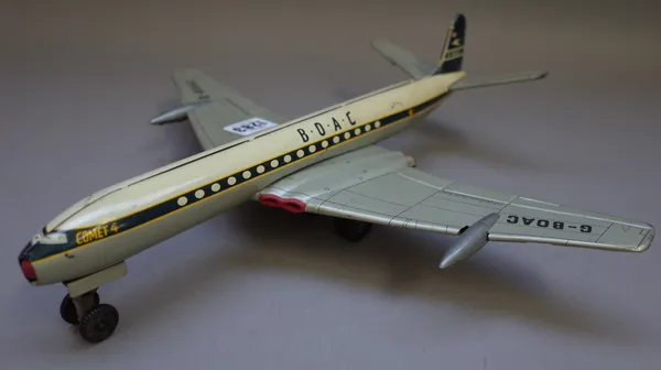 .An English Welsotoys tinplate De Havilland Comet 4 'B.O.A.C' aeroplane, circa 1950, with friction drive, 35.5cm, boxed.