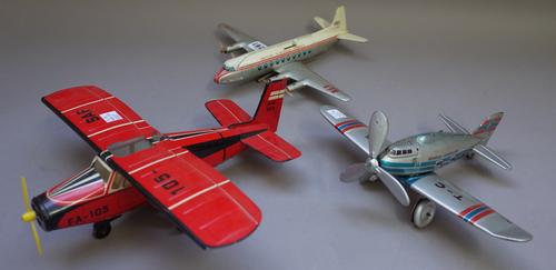A West German tinplate aeroplane 'British European Airways' with friction driven propellers 24.5cm, another tinplate clockwork propeller driven plane,