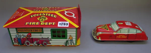 A Marx tinplate automatic Fire House, with friction powered Fire Chief car, boxed, (2).