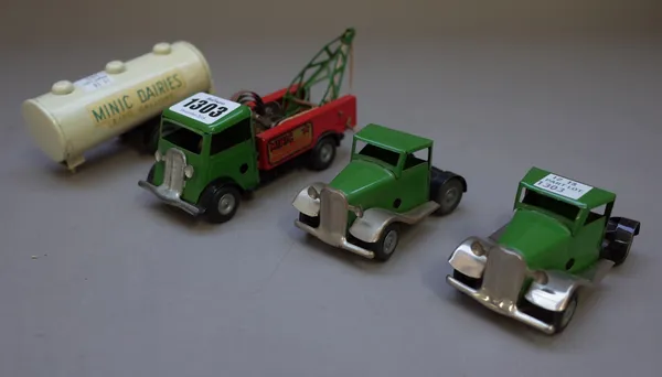 A Triang Minic clockwork breakdown truck, green cab, red body, a Minic Dairies tanker and one further truck cab for a tanker, (3).