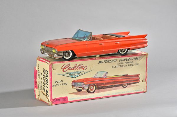 A Cragstan SSS Tokyo, battery powered tinplate Cadillac, red livery, boxed, 43cm. Illustrated.