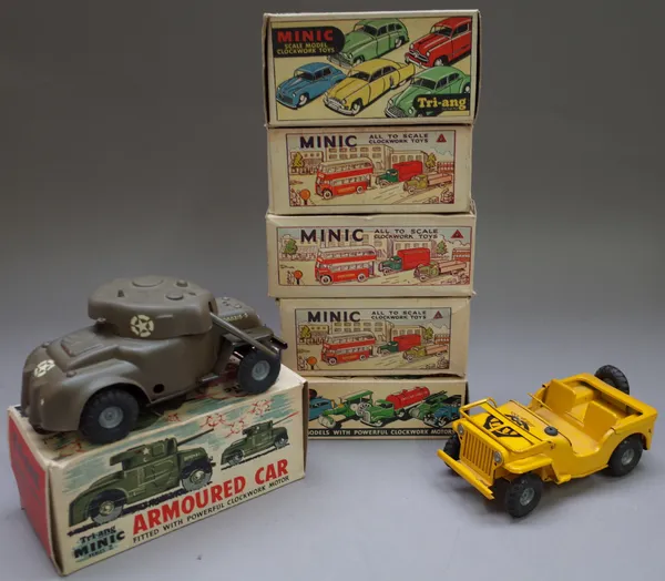 Seven Triang Minic boxes including; timber lorry, delivery van, transport van and others, also a Minic series II armored car, boxed and a Minic 'AA' J