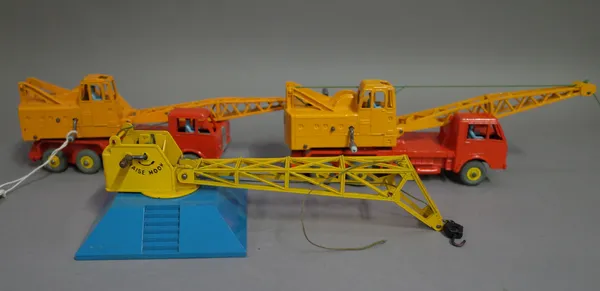 Eight Dinky toys commercial die-cast vehicles, comprising; two 972 20-ton Lorry Mounted Cranes, 401 Coventry Climax fork lift truck, 14C Coventry Clim