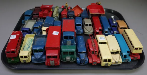 A quantity of Dinky die-cast vehicles, pre and post war including Foden lorry, 'Slumberland' Guy truck, Guy flatbed lorry, numerous buses, Bedford tip