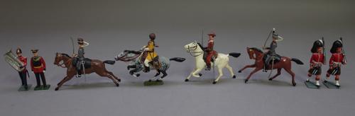 A quantity of Britains hollow cast lead figures, pre-war, military subjects, (repainted), (qty).