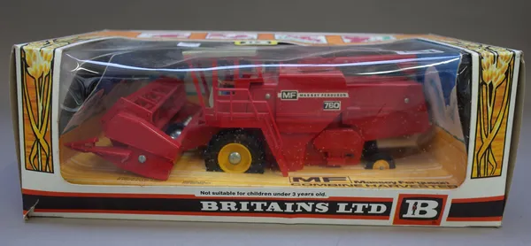 A Britains 9570 combine harvester, a Britains 9575 New Holland combine harvester, a Corgi 42 Agricultural set, a Britains 4711 model farmyard, all box