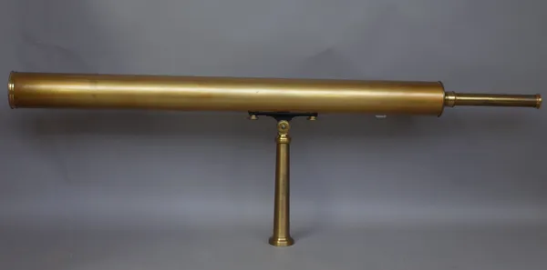 A 3.5 inch brass cased telescope with tripod arm and adjustable eyepiece, unsigned, in a mahogany case, 97cm.