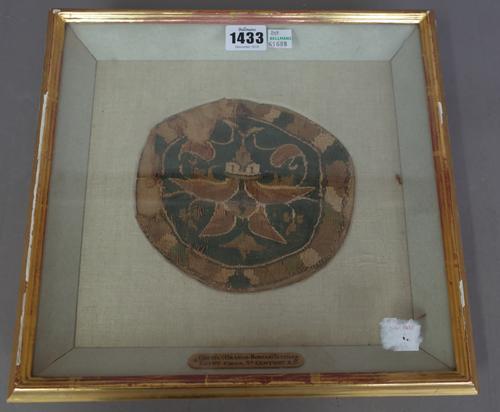 A coptic Graeco-Roman, textile fragment, 5th century A.D, framed and glazed approx 16cm wide, one further depicting an Egyptian figure and two rolled