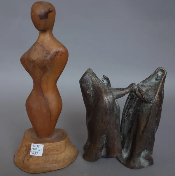 A patinated bronze depicting two stylised cloaked figures, unsigned, 14cm high and an abstract carved wooden figure on a naturalistic base, 23cm high,
