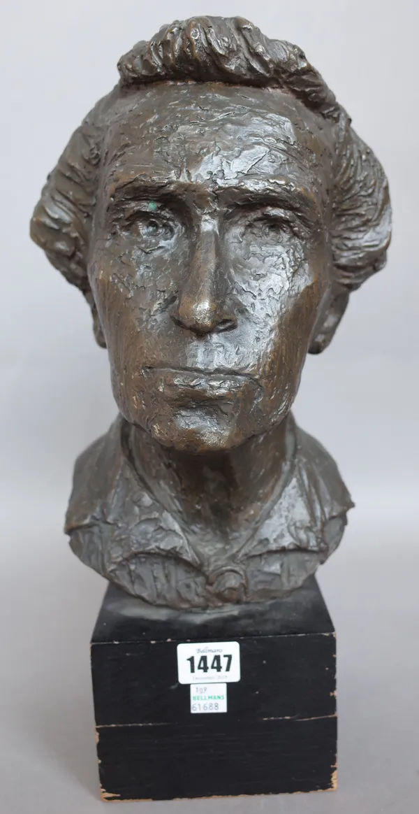 A bronze bust of an elderly lady, early 20th century, signed E.H. Stein to the cast, on an ebonised wooden plinth, 39.5cm high overall.