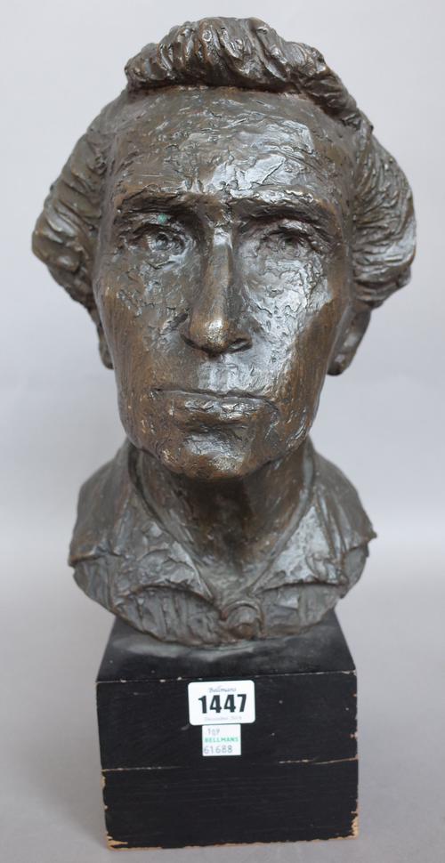 A bronze bust of an elderly lady, early 20th century, signed E.H. Stein to the cast, on an ebonised wooden plinth, 39.5cm high overall.