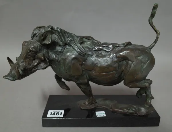 A modern patinated bronze warthog, indistinctly signed on a black marble plinth, 28cm wide, a composite bronze tiger, indistinctly signed and dated 19