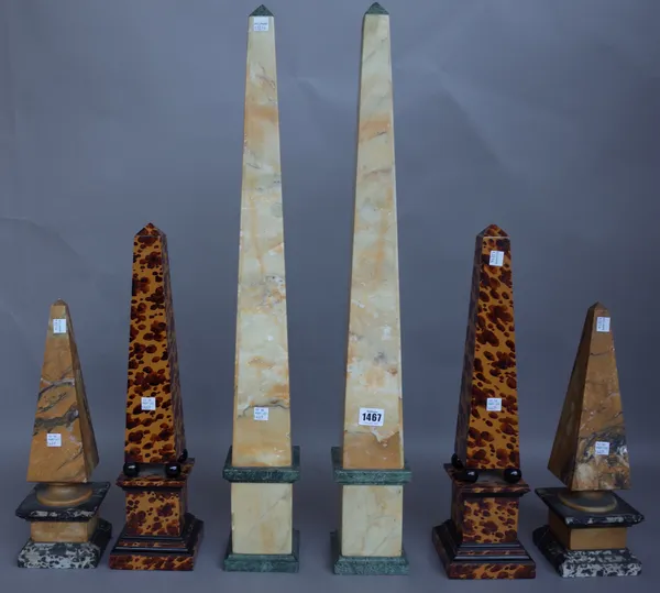 A pair of variegated marble obelisks, early 20th century, of typical square section form, 72.5cm, a smaller pair of Victorian marble obelisks, 36cm hi