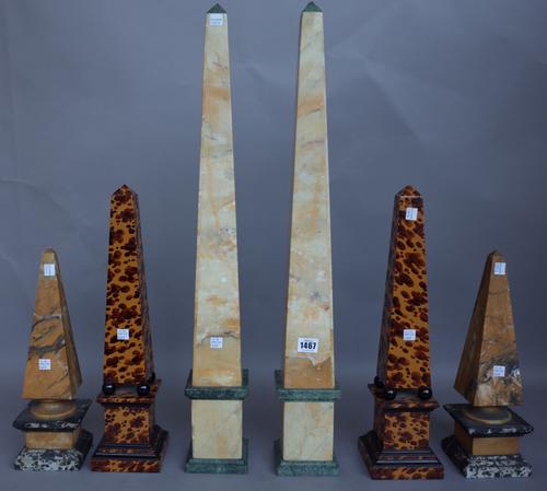 A pair of variegated marble obelisks, early 20th century, of typical square section form, 72.5cm, a smaller pair of Victorian marble obelisks, 36cm hi
