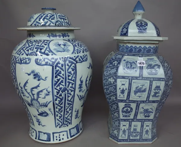 A modern Chinese blue and white vase and cover of canted square baluster form, decorated allover with further Chinese vases, 62cm high and another mod