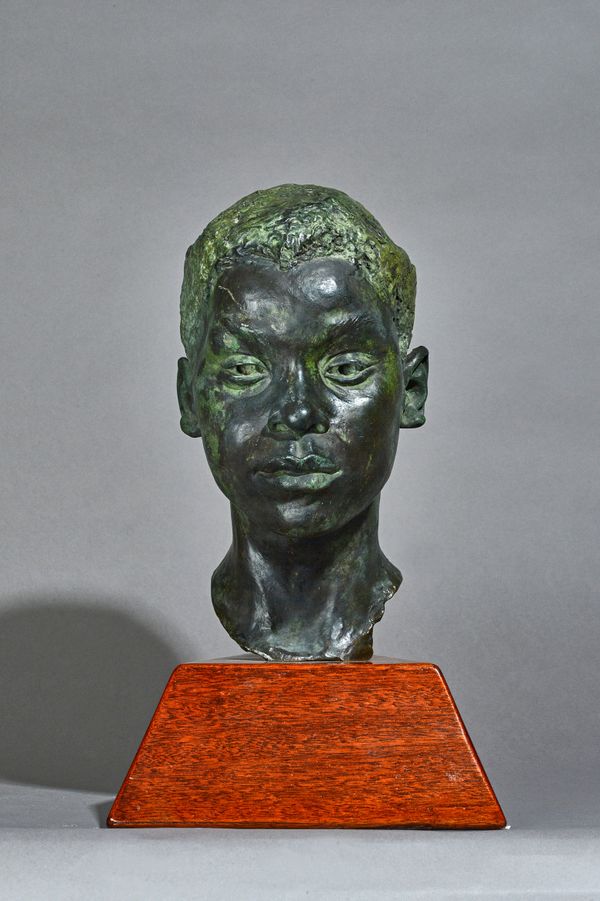 Sharon Keenan (British 1948-2017), a verdigris patinated bronze bust of an African male 'Dear Africa' signed 'SHARON KEENAN' and dated 1980 on a woode