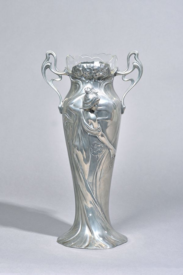A WMF figural pewter Art Nouveau twin handled vase with detachable glass liner stamped maker's marks, circa 1900, 36.5cm high. Illustrated.
