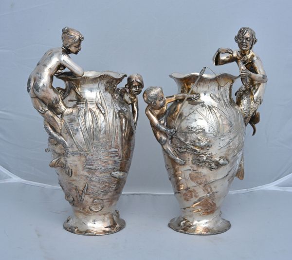 A pair of WMF plated pewter figural vases with children and merfolk stamped maker's marks, circa 1900 28.5cm high, (2). Illustrated. AFTERSALE