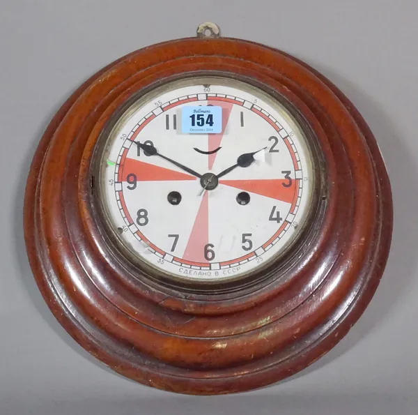 A Circular Victorian mahogany wall clock with eight day movement and painted Russian face.   CAB
