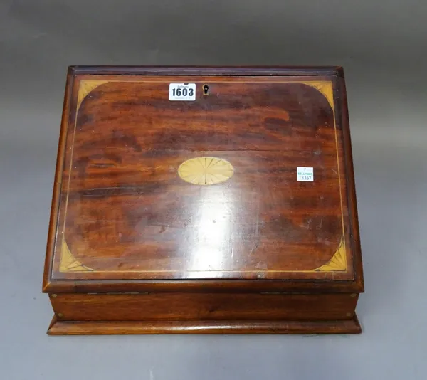 An Edwardian inlaid mahogany slope fronted stationery box, 36cm wide x 25cm high, together with a George IV burr yew tea caddy, of bloated sarcophagus