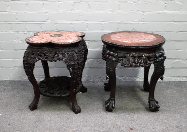 A late 19th century Chinese carved hardwood jardiniere stand, with marble inset top, 43cm wide x 48cm high, together with another similar, (2).