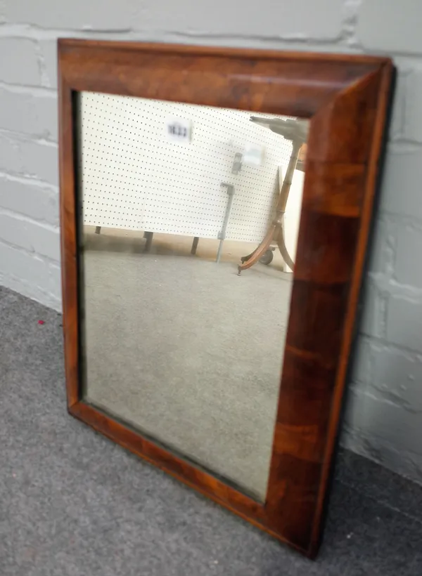 A George I walnut cushion framed mirror, 42cm wide x 53cm high.