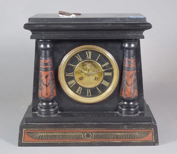 A 19th century black slate and rouge marble cased 8 day Egyptian Revival mantel clock.   S1B