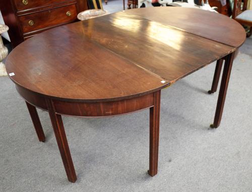 A George III mahogany 'D' end extending dining table on square supports, one extra leaf, 121cm wide x 118cm long x 178cm fully extended.