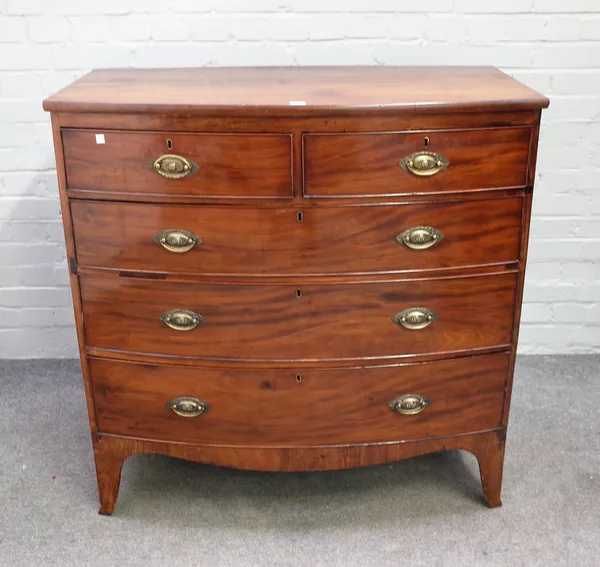 A Regency mahogany bowfront chest of two short and three long graduated drawers, on splayed bracket feet, 103cm wide x 104cm high.