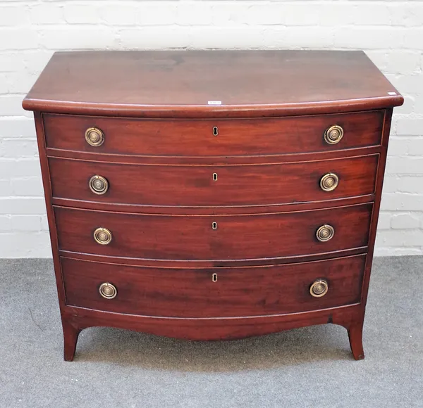 A 19th century mahogany bowfront chest of three long graduated drawers on splayed bracket feet, 98cm wide x 85cm high x 54cm deep.