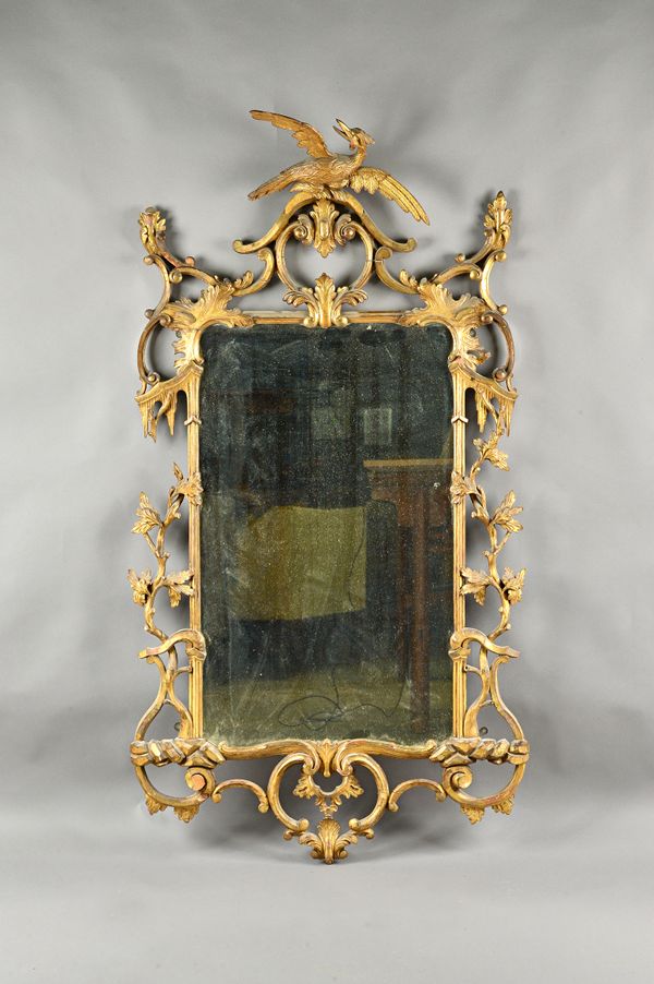 A mid-18th century gilt frame mirror, with Ho-ho bird crest over pierced frame, 71cm wide x 148cm high. Illustrated.