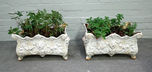 A pair of Rococo Revival white painted rectangular planters, on scroll feet, 48cm wide x 27cm high, (2).