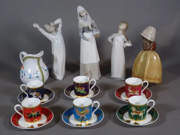 Ceramics, including; a group of four Lladro figures, a Hermes jug decorated with pelicans and a Villeroy & Boch coffee service comprising cans and sau