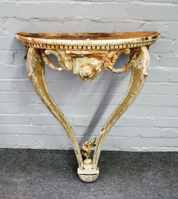 A 19th century white painted console table with swag frieze, 63cm wide x 85cm high.