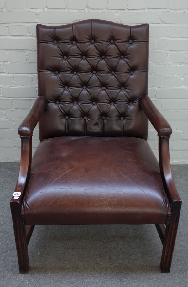 A mahogany framed open armchair of 18th century Gainsborough design on channelled block supports, 70cm wide x 101cm high.