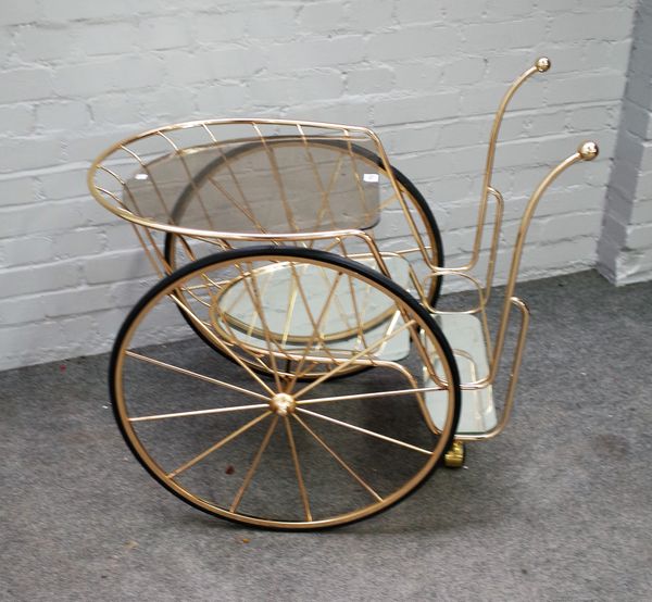 A 20th century lacquered brass drinks trolley, 90cm wide x 79cm high.