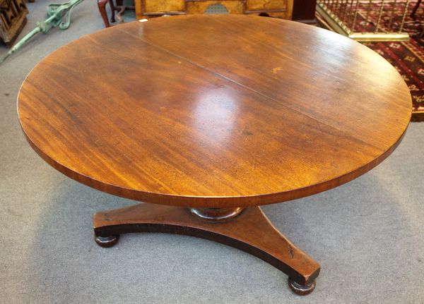 A William IV mahogany circular snap-top centre table on trefoil platform, 126cm diameter.