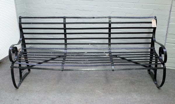 A 19th century black painted wrought iron strapwork garden bench, 185cm wide x 86cm high.