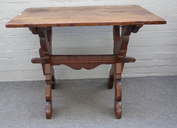 A 19th century Italian walnut tavern table, the rectangular top on shaped 'X' frame supports, 64cm wide x 100cm long x 78cm high.