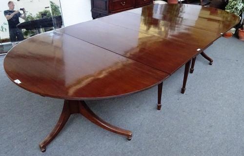 A made-up 19th century mahogany triple section 'D' end extending dining table with central drop flap section, to include two extra leaves, 137cm wide